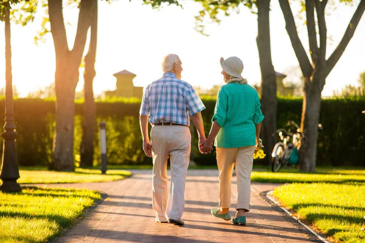 Mount Olympus Pure Foods - Elderly couple walking along a path